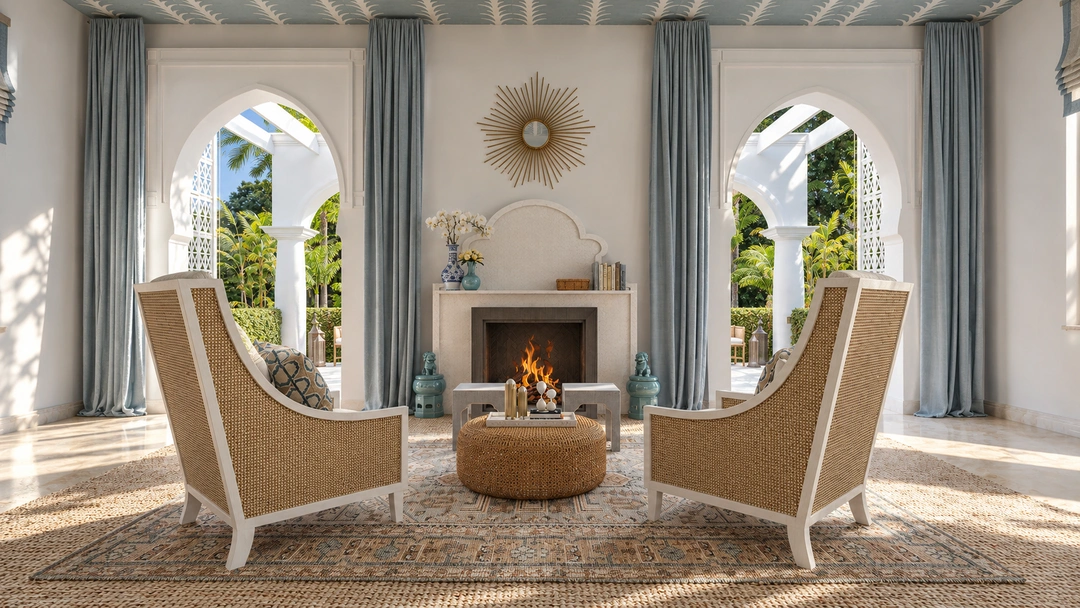 Fireside seating beneath arched windows and a sunburst mirror — Miami, FL, Studio Dalika residential design